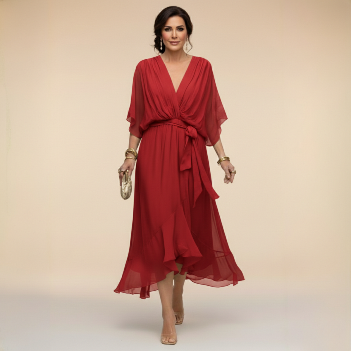 Woman wearing a red dress with a plain background