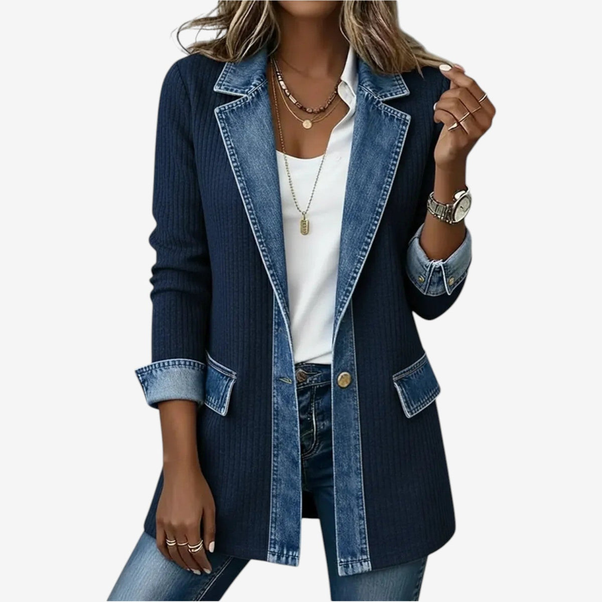 Denim jacket worn by a person on a white background